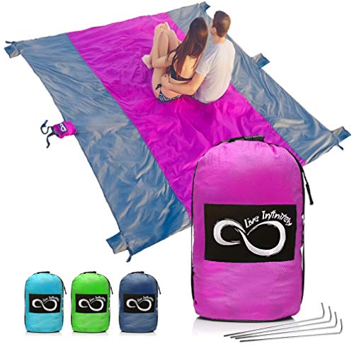 Sand Free Beach Blanket- 7 Person 9’ x 10’ Sand Proof Mat – Travel Friendly for Festivals & Hiking- Extremely Soft Quick Drying Heat Resistant Nylon- 4 Anchor Loops & Stakes Purple Middle